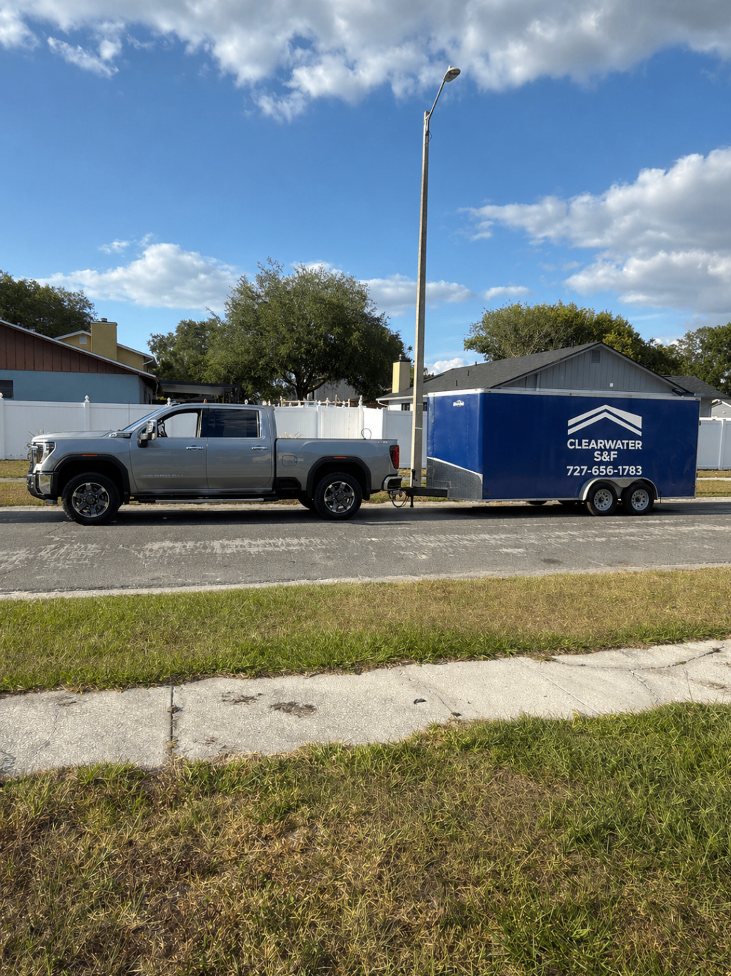 Clearwater Soffit & Fascia branded work truck and trailer serving Pinellas County and Tampa Bay